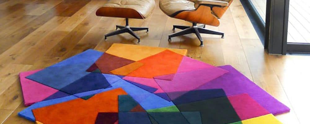 Layering rugs can add depth and texture to your hotel's design.